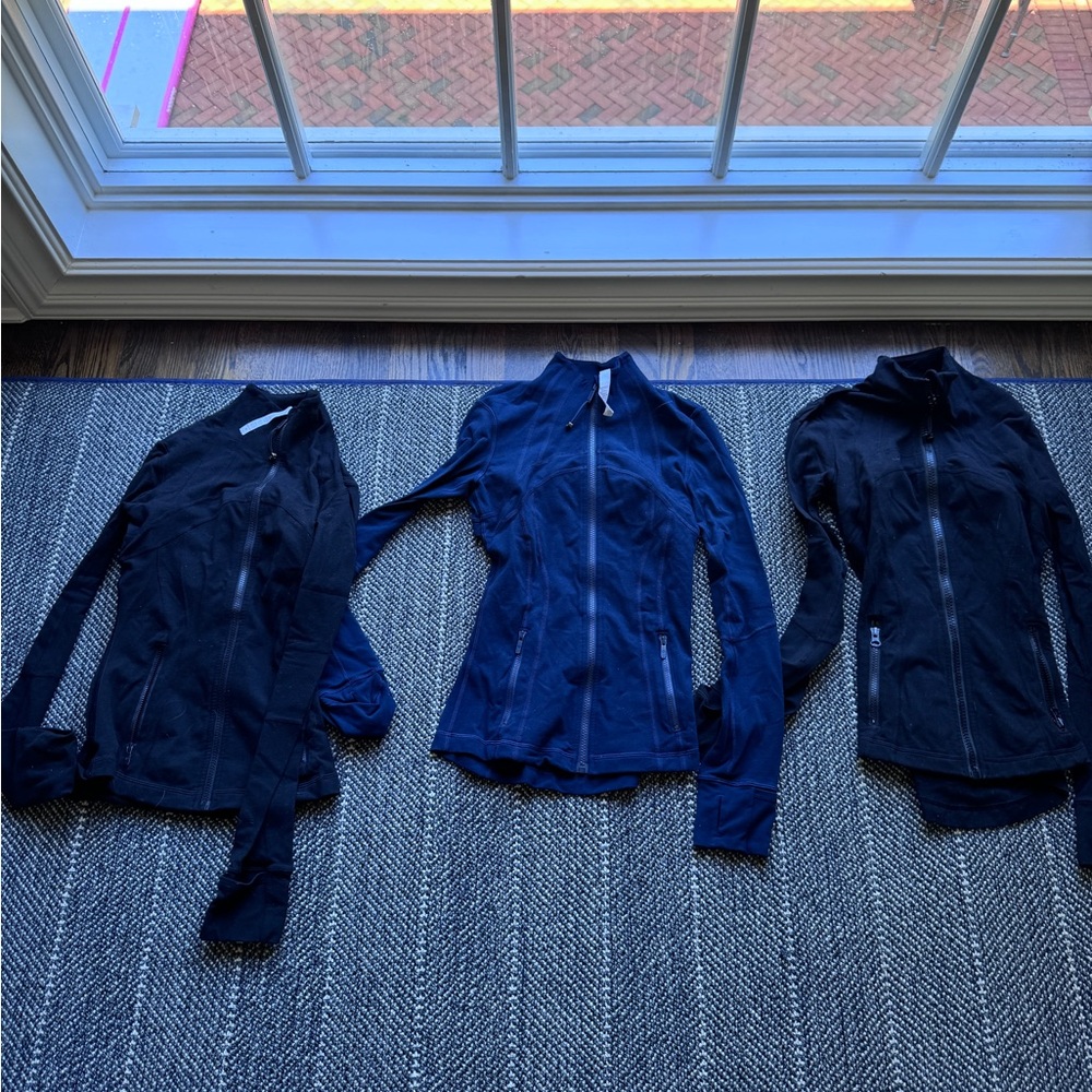 Lululemon bundle - two black and one navy zip up. Size 2